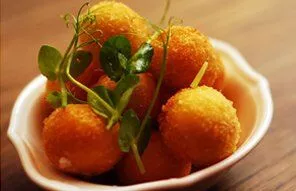 Golden fried goat's cheese croquettes
