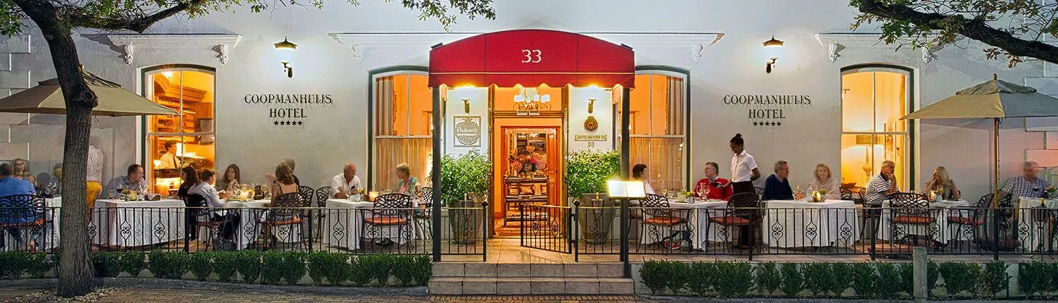The front porch of Coopmanhuijs at dusk