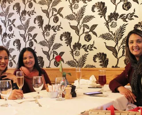 Friends at the Women's Day table